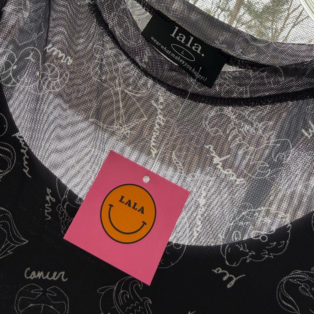 DRESSED IN LALA 
Mad About You Mesh Dress + Slip in Zodiac Love